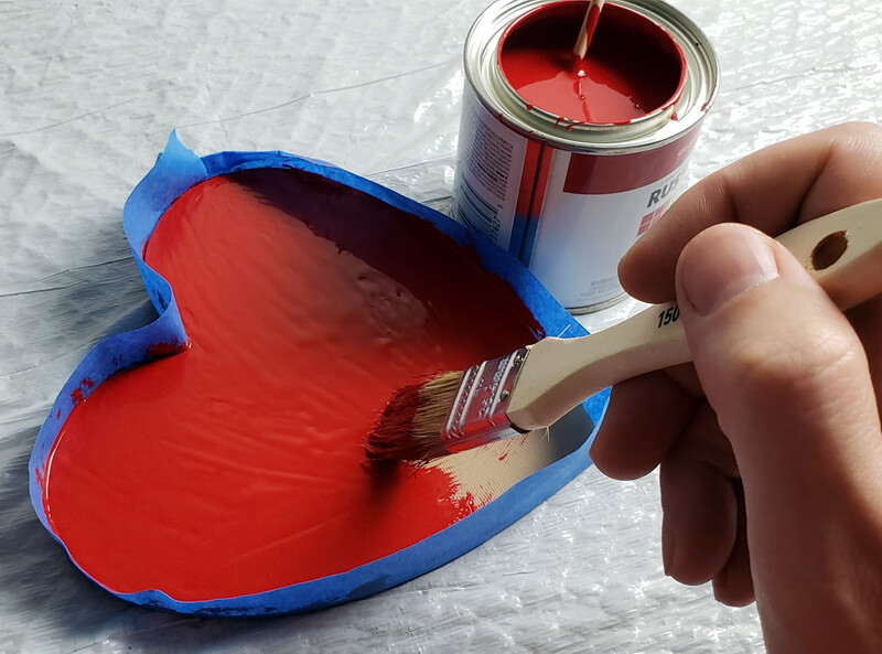 Painting an enamel adhesive base for flock